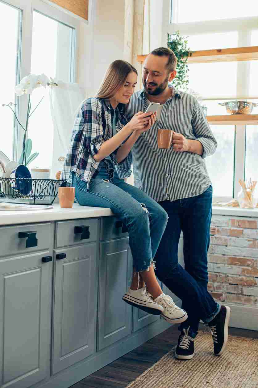 couple bonding in the kitchen area